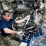 ISS043E190395 (05/13/2015) --- NASA astronaut Terry Virts prepares the Multi-user Droplet Combustion Apparatus from inside the Combustion Integrated Rack for upcoming runs of the FLame Extinguishment Experiment, or FLEX-2. The FLEX-2 experiment studies how quickly fuel burns, the conditions required for soot to form, and how mixtures of fuels evaporate before burning. Understanding these processes could lead to the production of a safer spacecraft as well as increased fuel efficiency for engines using liquid fuel on Earth.