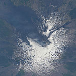 ISS043182340 (05/08/2015) --- NASA astronaut Scott Kelly took this intriguing picture of Mount Etna, a volcano on the Italian island of Sicily. Located on the northeast part of the island it first erupted 500,000 years ago and is still active today. Scott tweed this image from the International Space Station with the comment: "MtEtna Highest European active #volcano lives up to its Italian name Mongibello (beautiful mountain) from space too".