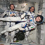 ISS043E174193 (05/06/2015) --- NASA astronaut Terry Virts (left) Commander of Expedition 43 on the International Space Station along with crewmates Russian cosmonaut Anton Shkaplerov (center) and ESA (European Space Agency) astronaut Samantha Cristoforetti on May 6, 2015 perform a checkout of their Russian Soyuz spacesuits in preparation for the journey back to Earth.