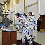 CG4G8721 --- (6 May 2015) --- At the Gagarin Cosmonaut Training Center in Star City, Russia, Expedition 44/45 backup Flight Engineer Timothy Kopra of NASA signs in for the first of two days of qualification exams May 6 as his crewmates, Yuri Malenchenko o