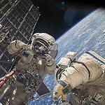 Russian Spacewalkers Work Outside Station