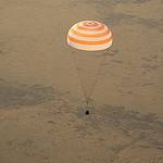 The Soyuz TMA-09M is Seen Moments Before it Lands