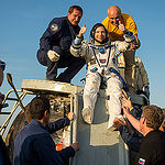 Expedition 43 commander Terry Virts of NASA is helped out of the Soyuz TMA-15M spacecraft just minutes after he and cosmonaut Anton Shkaplerov of the Russian Federal Space Agency (Roscosmos), center, and Italian astronaut Samantha Cristoforetti from Europ