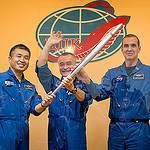 Expedition 38 Trio With Olympic Torch