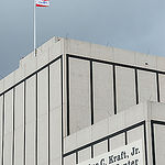 Orion flag flying above Christopher C. Kraft, Jr., Mission Control Center building